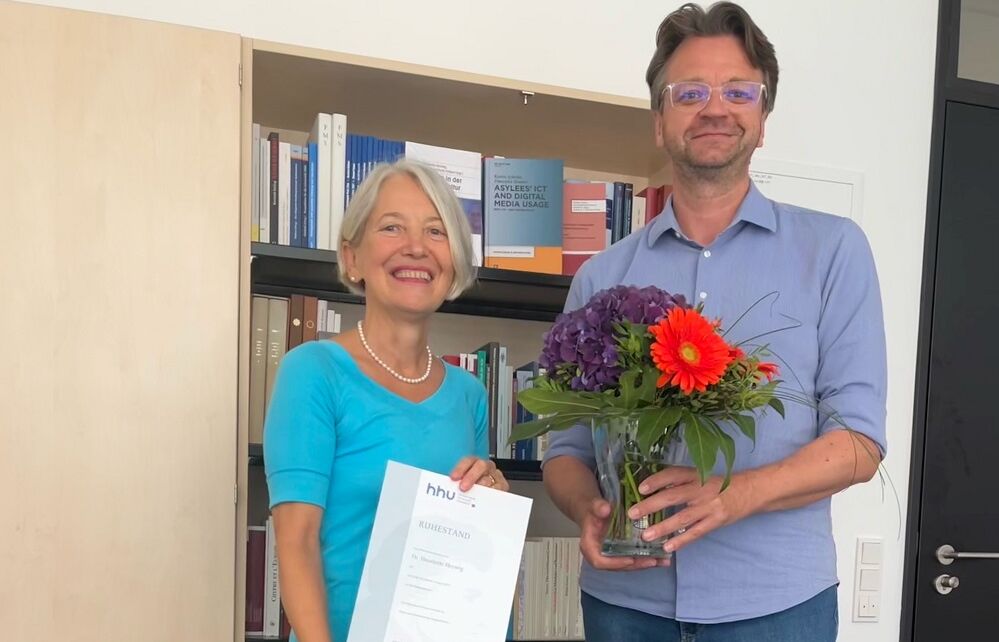 Prof. Henriette Herwig und Dekan Achim Landwehr